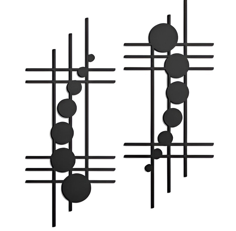 Two black geometric iron wall decor pieces with lines and circles on a white background