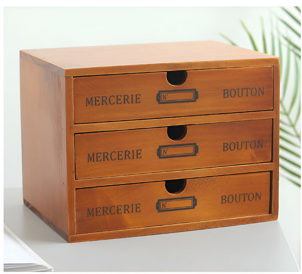 Retro wooden desktop drawer organizer with three closed drawers, front view